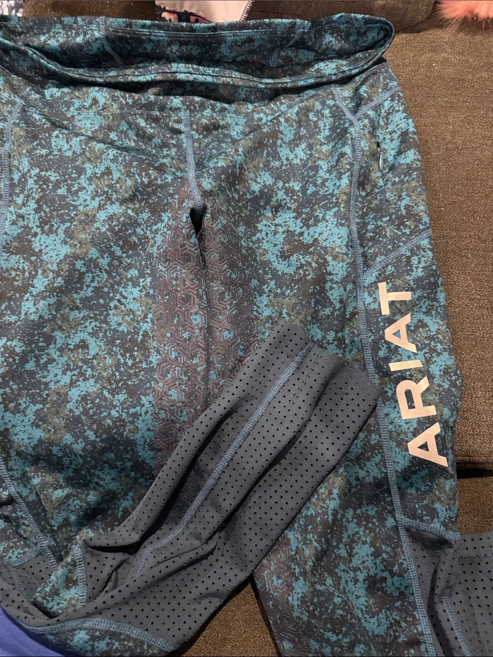 Ariat Teal and Black Girls' Printed Performance Leggings
For horse back riding - Picture 1 of 6